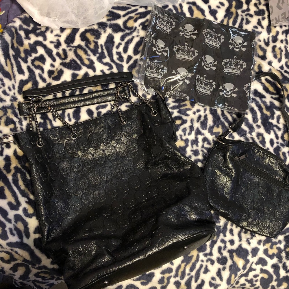 New black skull purse